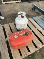One propane tank, one boat gas tank