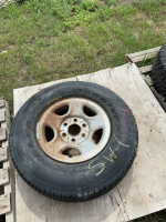 One Goodyear tire on six bolt steel rim