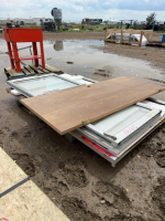 Pallet of mixed aluminum and glass doors