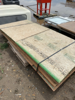 Lift of assorted plywood and chip board sheets