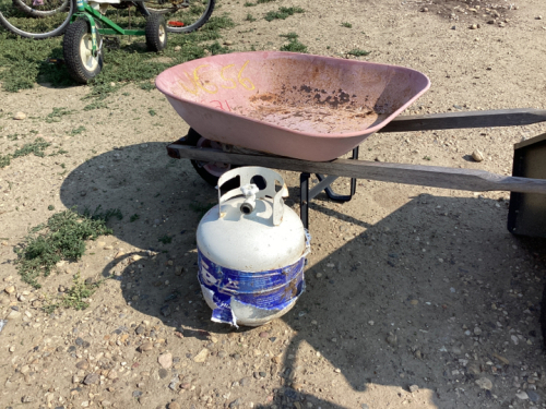 PROPANE TANK AND WHEELBARROW