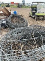 Three pallets of barbed wire