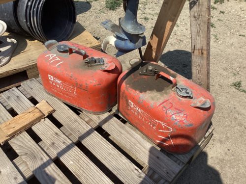 2 BOAT GAS CANS AND EVENRUDE MOTOR