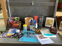 (2)BOXES - CUTTING MAT, FELT PROTECTORS, SMALL GARBAGE CAN, BLOOD PRESSURE MONITOR, SELFIE STICK
