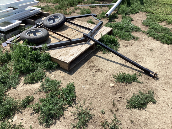 METAL FRAME WITH PIN HITCH AND 2 SMALL TIRES