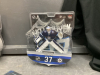BOX OF HOCKEY COLLECTIBLES - TIM HORTONS MINI STICKS, PAUL ANDERSON, HOLTE,AND HELLEBUYCK FIGURINES, MINI HOCKEY STICKS - 5