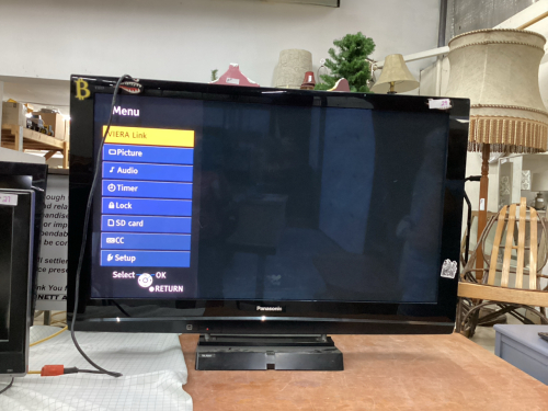 PANASONIC VISTA 50" FLAT SCREEN TV ON STAND. - NO REMOTE