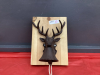 CAST DEER HEAD W/ BELL MOUNTED ON WOOD SLAB