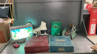Box with sporting equipment, games and aquatic light