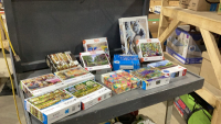 TOTE FULL OF PUZZLES