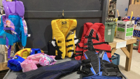 BAG OF KIDS + ADULT LIFE JACKETS + FLIPPERS