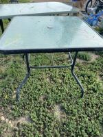 Glass top patio table