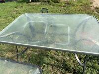 Glass top patio table