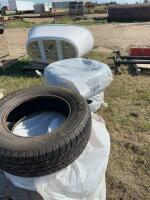 Stack of four winter car tires