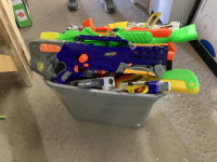 TOTE FULL OF NERF GUNS