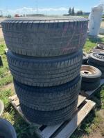 Stack of light truck tires on F150 rims
