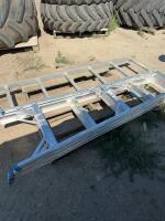 Two aluminum ladders