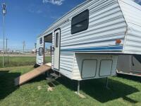 Camper trailer converted to toy haulier
