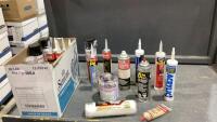 BOX W/ CONSTRUCTION GLUE, SPRAY FOAM INSULATION, PVC PRIMER, FLEX SEAL