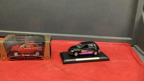 (2) DIE CAST COLLECTOR CARS - CHRYSLER PT CRUISER AND BURAGO 1998 FREELANDER