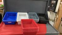 STACK OF SMALL PLASTIC DERO STORAGE BINS