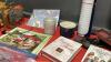 LAMINATED REUSEABLE WALL CALENDER, SPARE TIRE COVER (BIGFOOT), WATCH STRAP, PARK & LANE BRACELET, CANDLES, A FEW DVD'S - 4