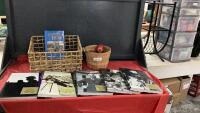 WICKER BASKET W/ ALBERTA HISTORY BOOKS, TAPPING THE BOW BOOK, AND AN APPLE BASKET W/ FAKE APPLES