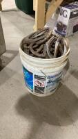 BUCKET OF USED HORSE SHOES