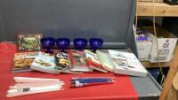 BOX OF COOKBOOKS, BLUE DESSERT BOWLS, TAPER CANDLES
