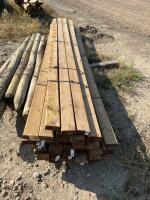 Bundle of 10 foot treated 2 x 4