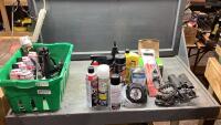 GREEN BASKET WITH SHOP FLUIDS , RV PLUG, SOLAR LIGHT