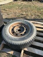 One good wrangler 17 inch truck tire on rim