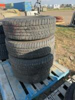 Stack of four Wrangler tires