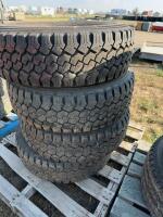 Stack of four light TRUCK 16 inch tires