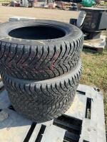 Three studded snow tires