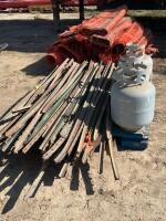 Pallet of steel post and three propane cylinders