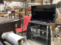 SHARP FLAT SCREEN TV W/GLASS SHELF STAND- DONATION