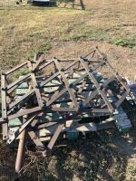 Two sections of heavy built diamond harrows