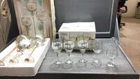 (2) BOXES - WINE GLASSES AND A 3 PIECE CANDLE HOLDER SET