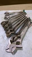 Adjustable wrenches