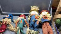 (2) SCARECROWS W/BAMBOO STICKS AND (2) SITTING SCARECROWS