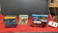 VINTAGE TOYS - BATTERY OPERATED TIN SPACE VEHICLE, WESTERN EXPRESS PLASTIC TRAIN, STREET CARS ALL IN GOOD LIDDED TOTE
