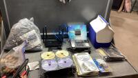 MISC BOX - DVD&rsquo;S, BOOSTER CABLES, PHONE, SMALL COOLER
