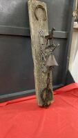 CAST HORSE BELL MOUNTED ON A PIECE OF RUSTIC BARN WOOD