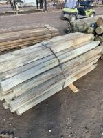 Bundle of used treated 6 foot drivers post