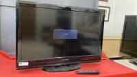 DYNEX 32" FLAT SCREEN TV W/ REMOTE ON STAND