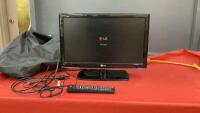 SMALL 18" LG FLAT SCREEN TV W/ REMOTE ON STAND