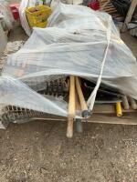 Pallet of shovels and rakes