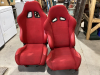 RED BUCKET SEATS