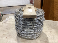 PARTIAL ROLL OF BARB WIRE